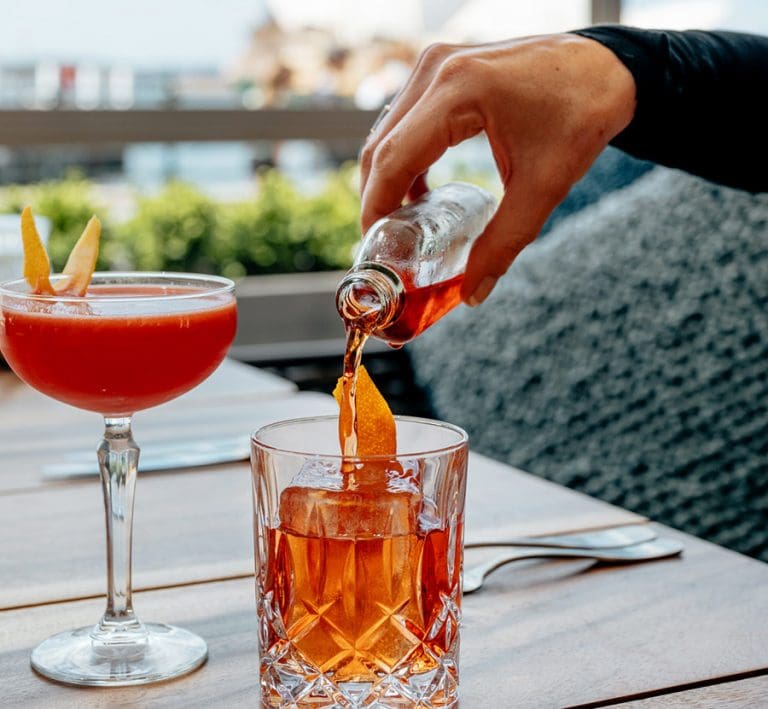 Sip the best cocktails in Sydney while waterside at 6HEAD in The Rocks